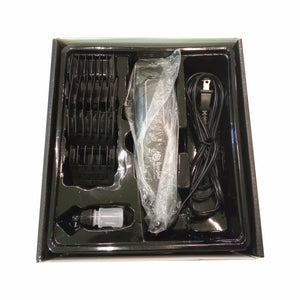 Hair trimmer set with attachments in a black box on a white background