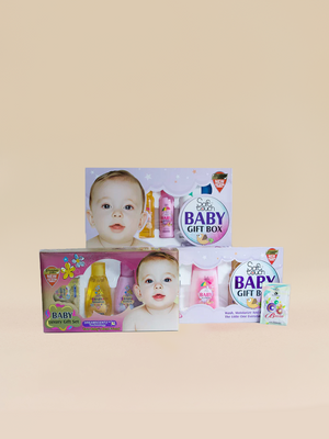 Baby gift box packaging with images of a baby and product bottles on a beige background