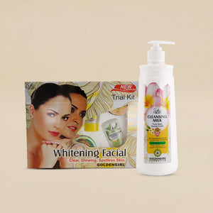 Cleansing milk bottle and packaging of a whitening facial kit on a beige background