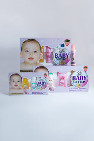 Baby gift box set with various items on a white background