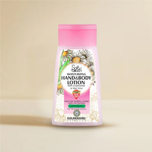 Hand and body lotion bottle with pink cap and floral design on a beige background