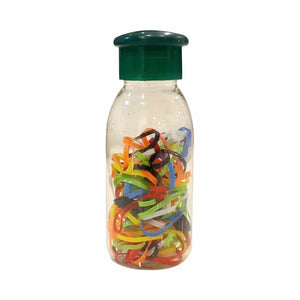 A clear plastic bottle with a green cap filled with multicolored rubber bands.