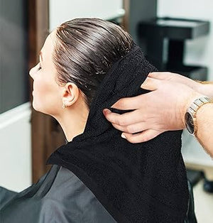 “Black salon towel for hair drying and spa use.”