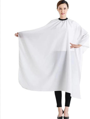 “Hair cutting sheet for salon clients to protect clothing during haircuts.”