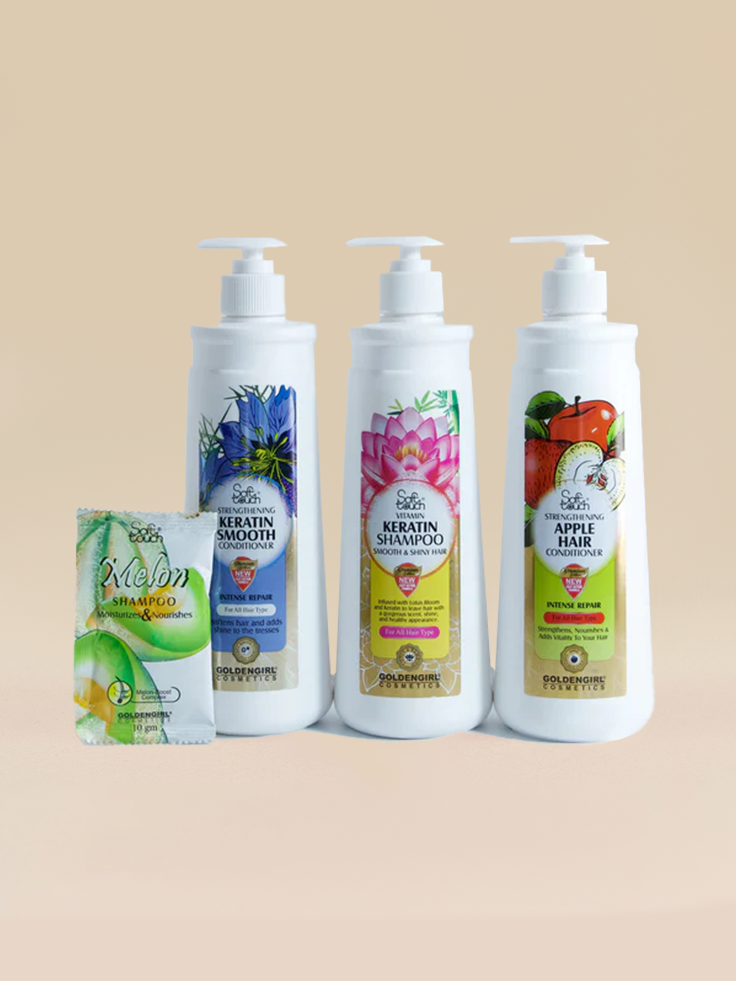 Set of hair care products with various labels on a beige background