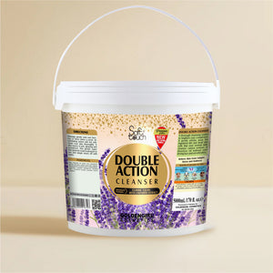 Bucket of Double Action Cleanser with a label on a beige background