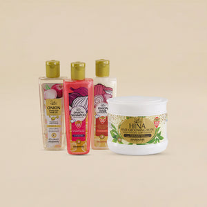Set of hair care products including shampoo and mask on a beige background