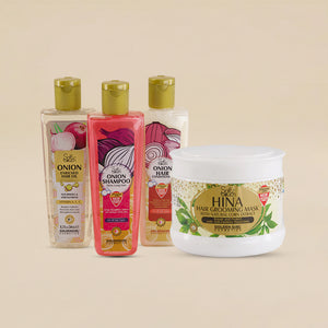 Set of hair care products including shampoo and mask on a beige background