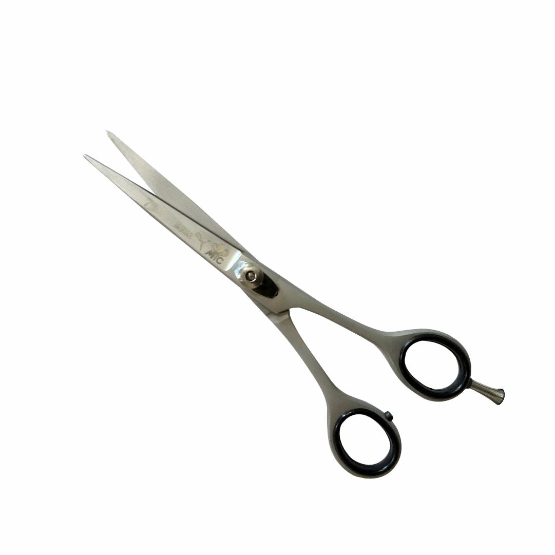 “7-inch hair cutting scissors made of stainless steel, designed for precise hair trimming and styling, suitable for professional or home use.”