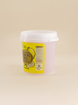 Container of lemon wax on a beige background