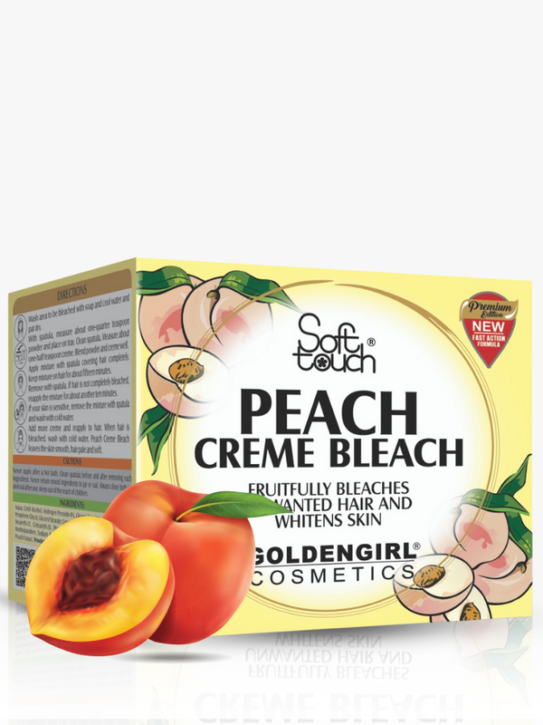 Box of Peach Creme Bleach by Goldengirl Cosmetics with peaches and green leaves on a white background.