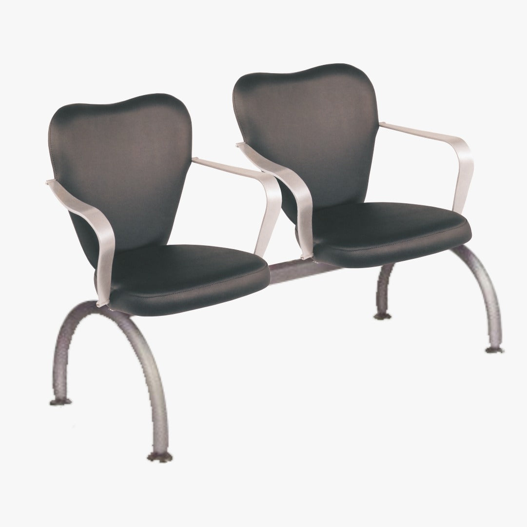 A pair of black salon chairs with chrome frames and armrests.