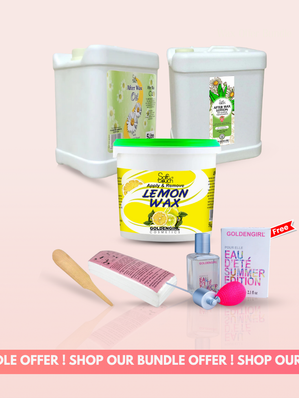 Collection of beauty products including a lemon wax container, hairbrush, and perfume on a pink background.